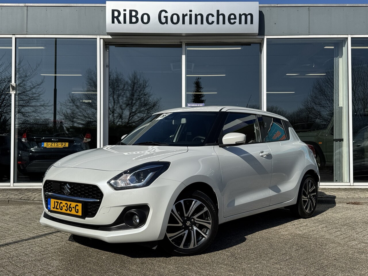 Suzuki Swift - 1.2 Stijl Smart Hybrid * Achteruitrijcamera * Trekhaak * - AutoWereld.nl