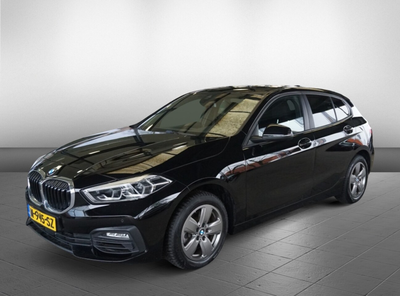 BMW 1-serie - 116i Business Edition | Schuif-/kanteldak | Navigatie | Carplay - AutoWereld.nl