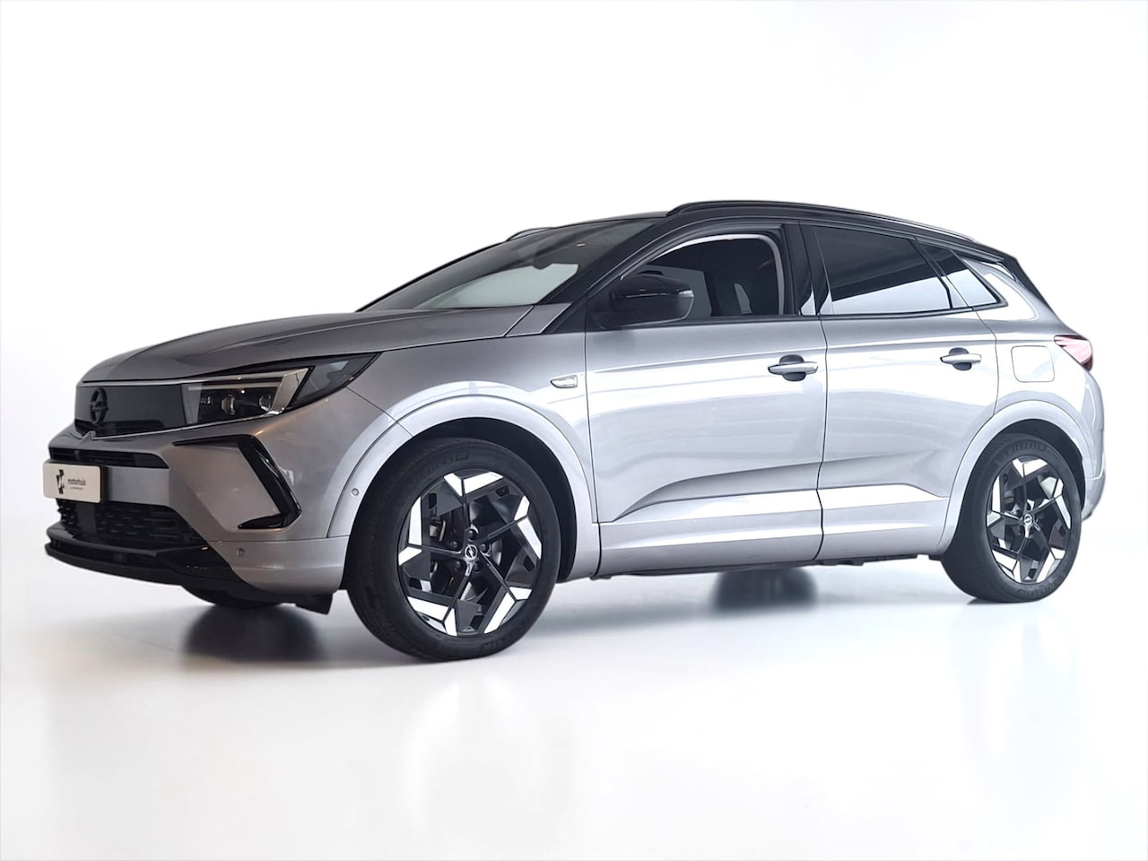 Opel Grandland - 1.6 Turbo PHEV 4x4 GSe 300pk Automaat NAVI CAMERA TREKHAAK LED WINTERPACK - AutoWereld.nl
