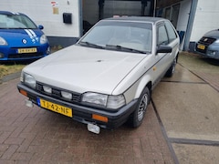 Mazda 323 - 1.5 GLX | Automaat