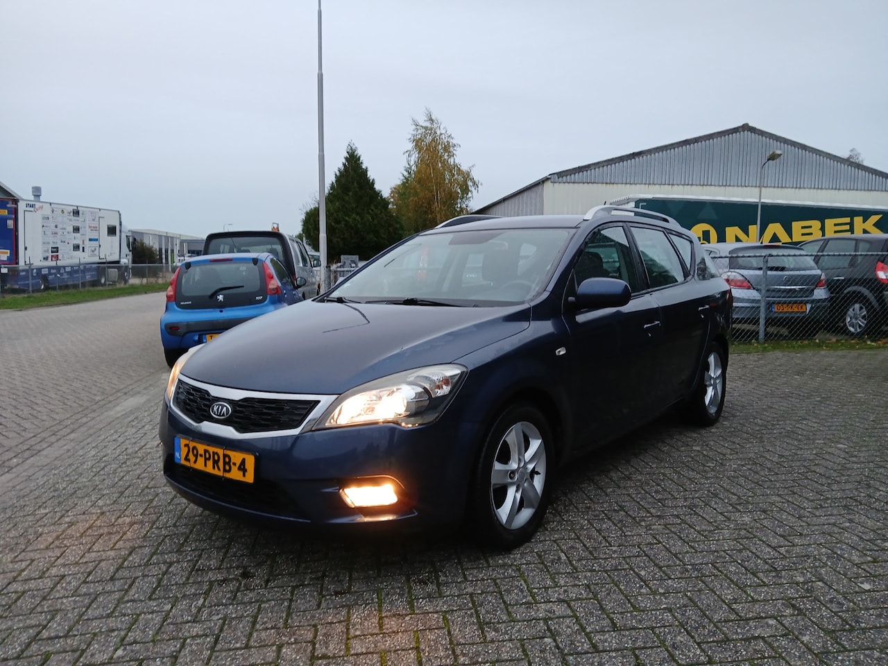 Kia Cee'd Sporty Wagon - 1.4 CVVT Seven 1.4 CVVT Seven - AutoWereld.nl