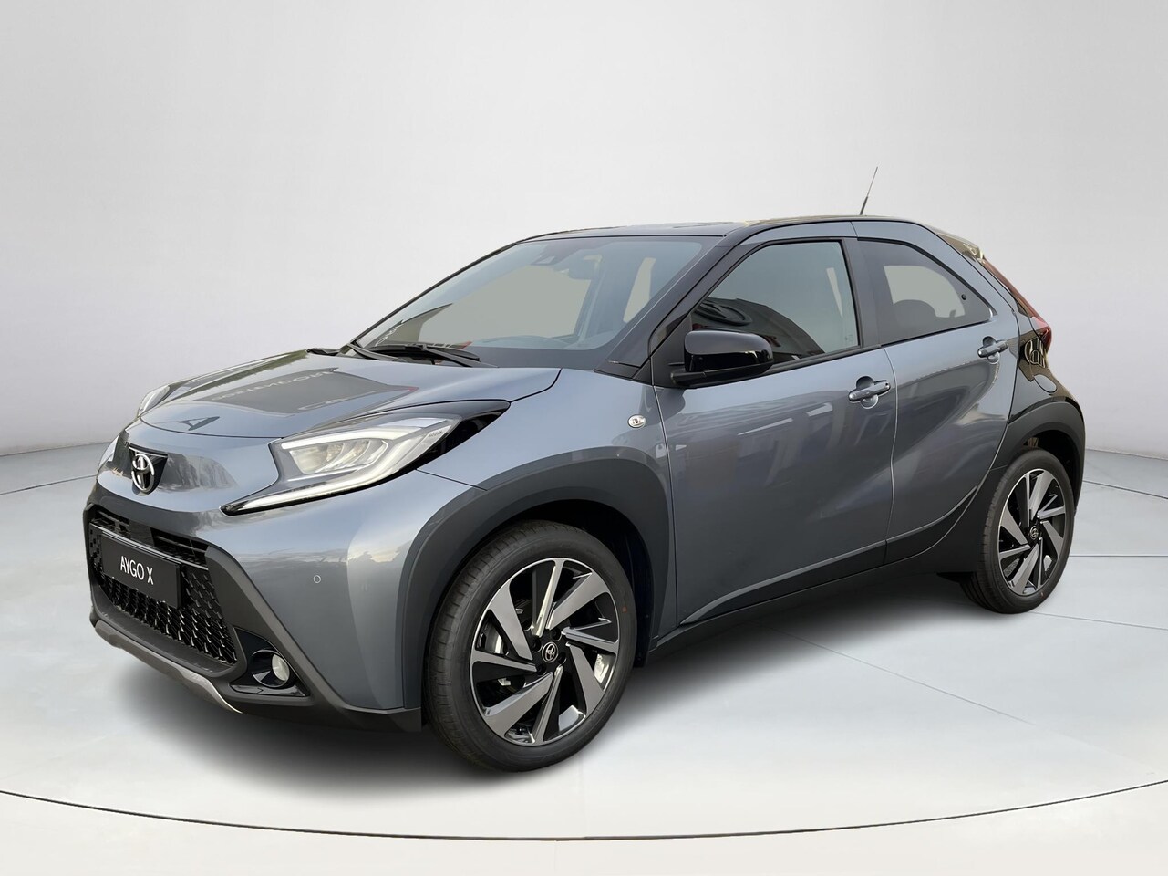 Toyota Aygo X - 1.0 VVT-i MT Envy | Celestite Grey met zwart dak | Demo | - AutoWereld.nl