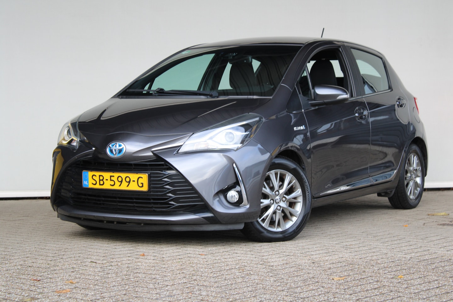 Toyota Yaris - 1.5 Hybrid Executive | Achteruitrijcamera | Climate control | Cruise control | Navigatie | - AutoWereld.nl