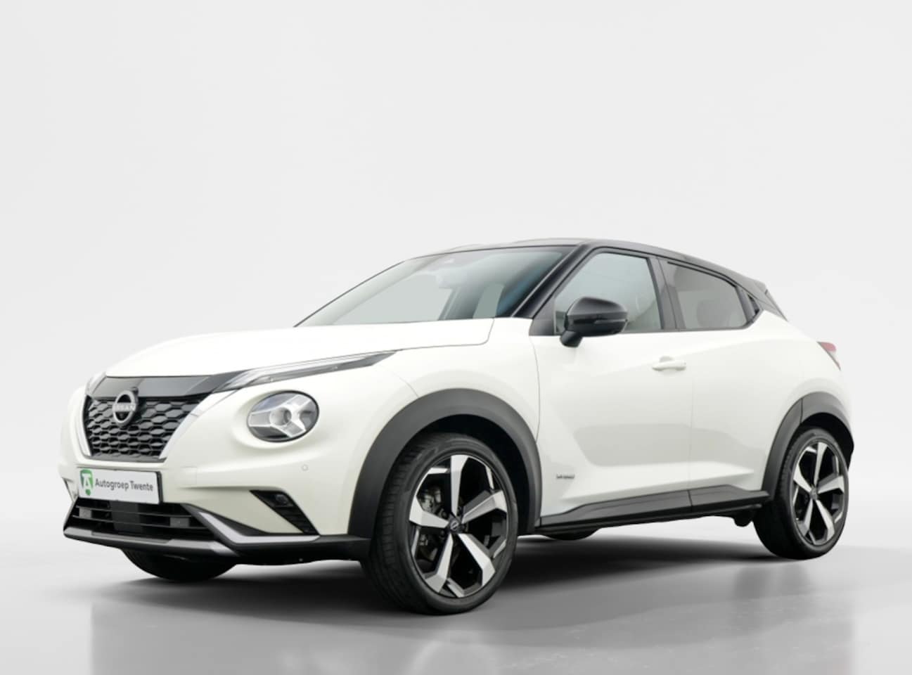 Nissan Juke - 1.6 Hybrid Tekna | Leer | 19 inch | Winterpack | BOSE - AutoWereld.nl