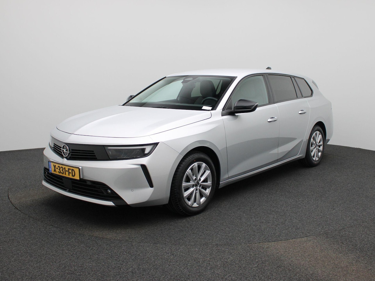 Opel Astra Sports Tourer - 1.2 Business Edition | APPLE/ANDROID CARPLAY | NAVIGATIESYSTEEM | STOELVERWARMING | LICHTM - AutoWereld.nl