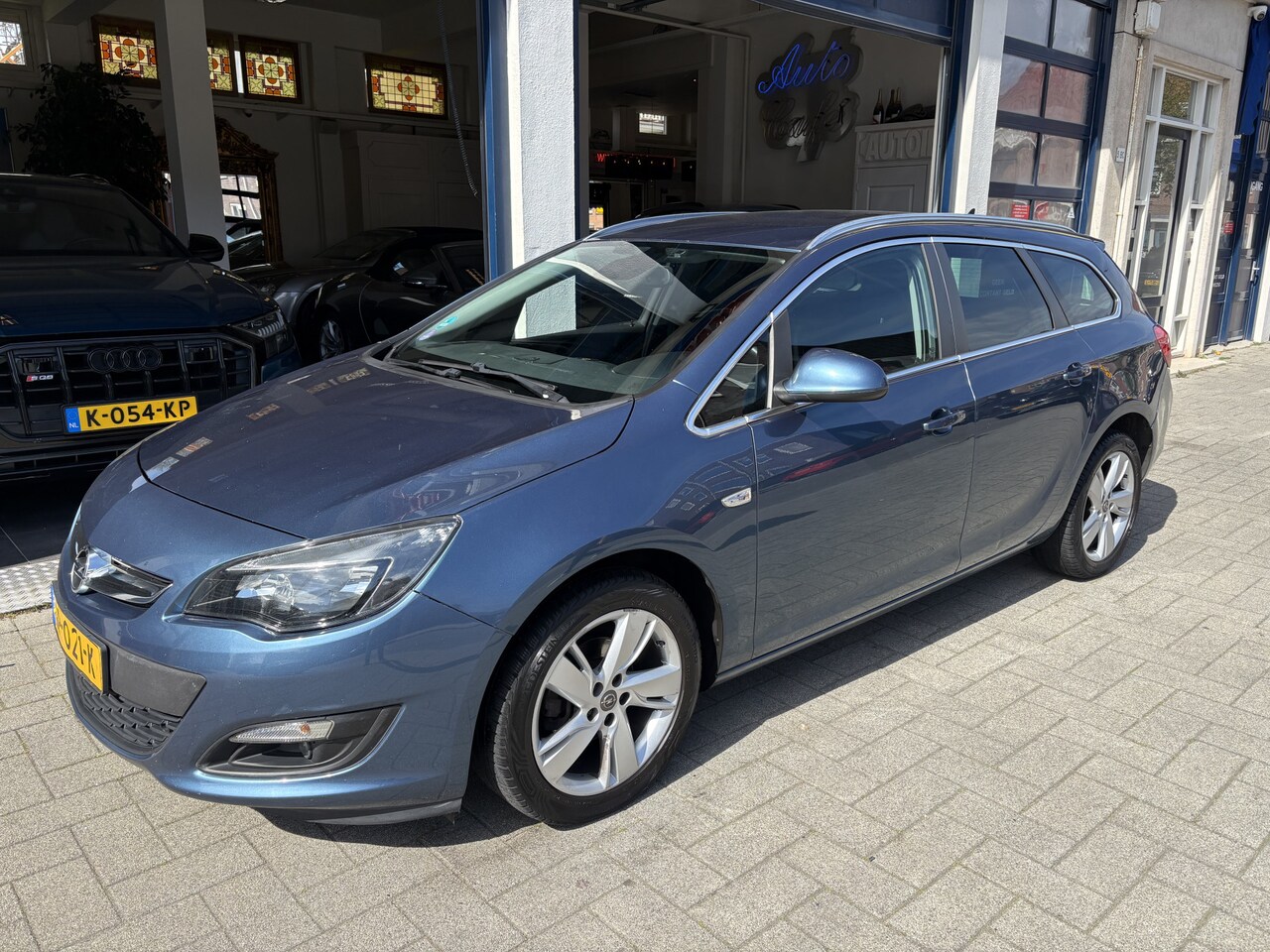 Opel Astra Sports Tourer - 1.4 Business + NW APK/NAVI/CLIMA - AutoWereld.nl