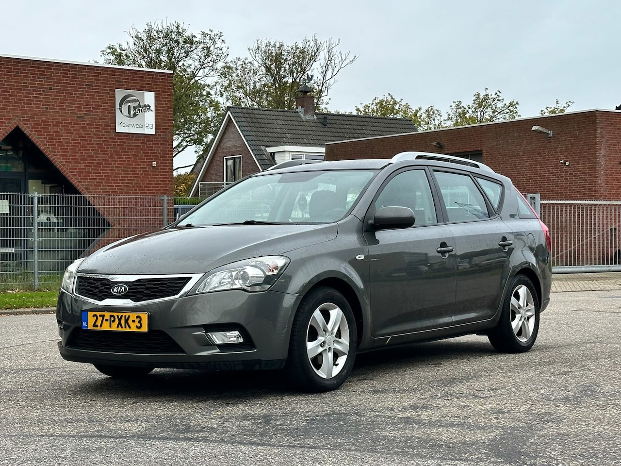 Kia Cee'd Sporty Wagon - 1.4 CVVT Seven Navigatie*Cruise*Trekhaak*Airco*LM velgen*APK* - AutoWereld.nl