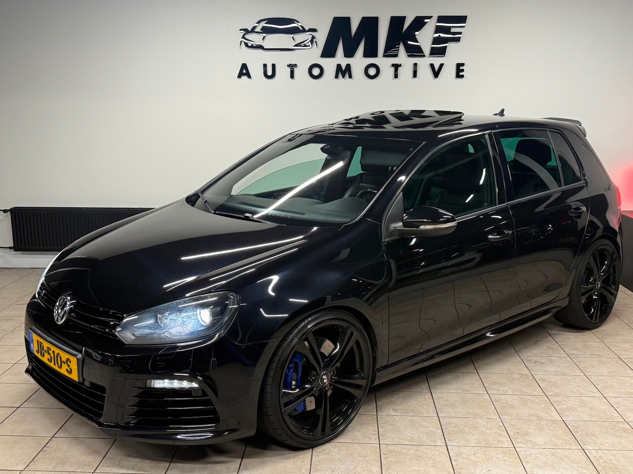 Volkswagen Golf - 2.0 R 4-Motion 5D 2010 Zwart ECC/DAKJE/LEER! - AutoWereld.nl