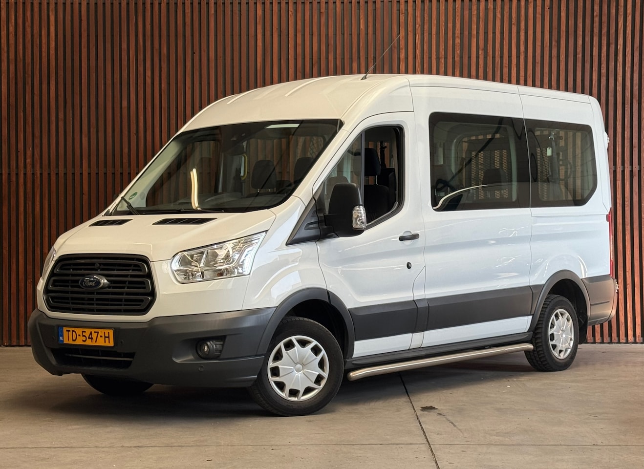 Ford Transit - 310 2.0 TDCI ROLSTOEL met Lift 9+1 NAVI-PDC-CRUISE-NWAPK-AIRCO - AutoWereld.nl