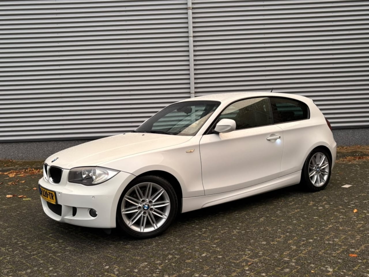 BMW 1-serie - 118i Bns Sp. PDC StoelVW Leder CruiseC - AutoWereld.nl
