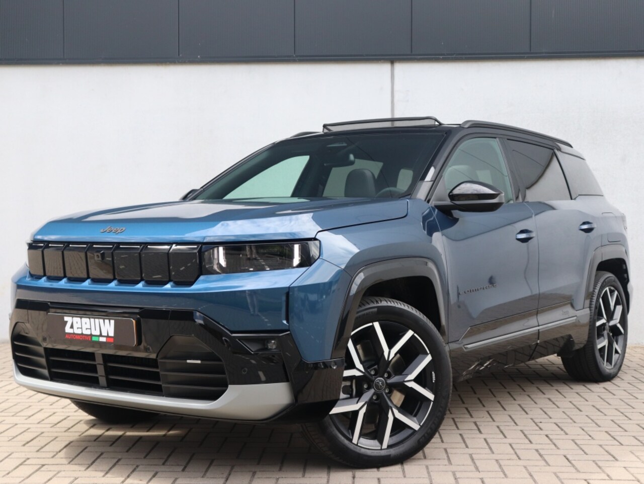 Jeep Compass - First Edition 74 kWh | Schuifdak | Premium | 360cam | 20" - AutoWereld.nl