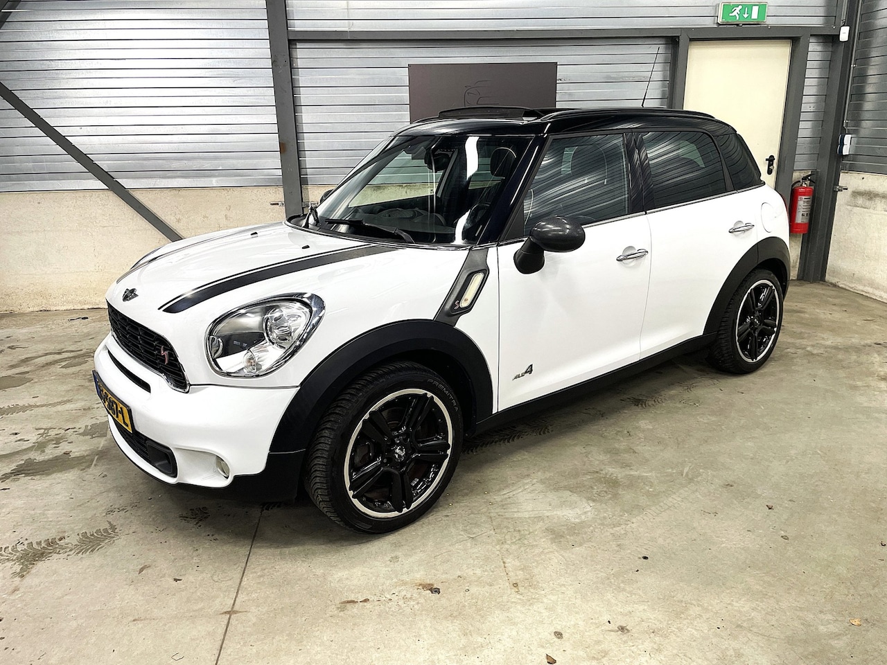 MINI Countryman - Mini 1.6 Cooper S ALL4 Chili pano dak 184 pk - AutoWereld.nl