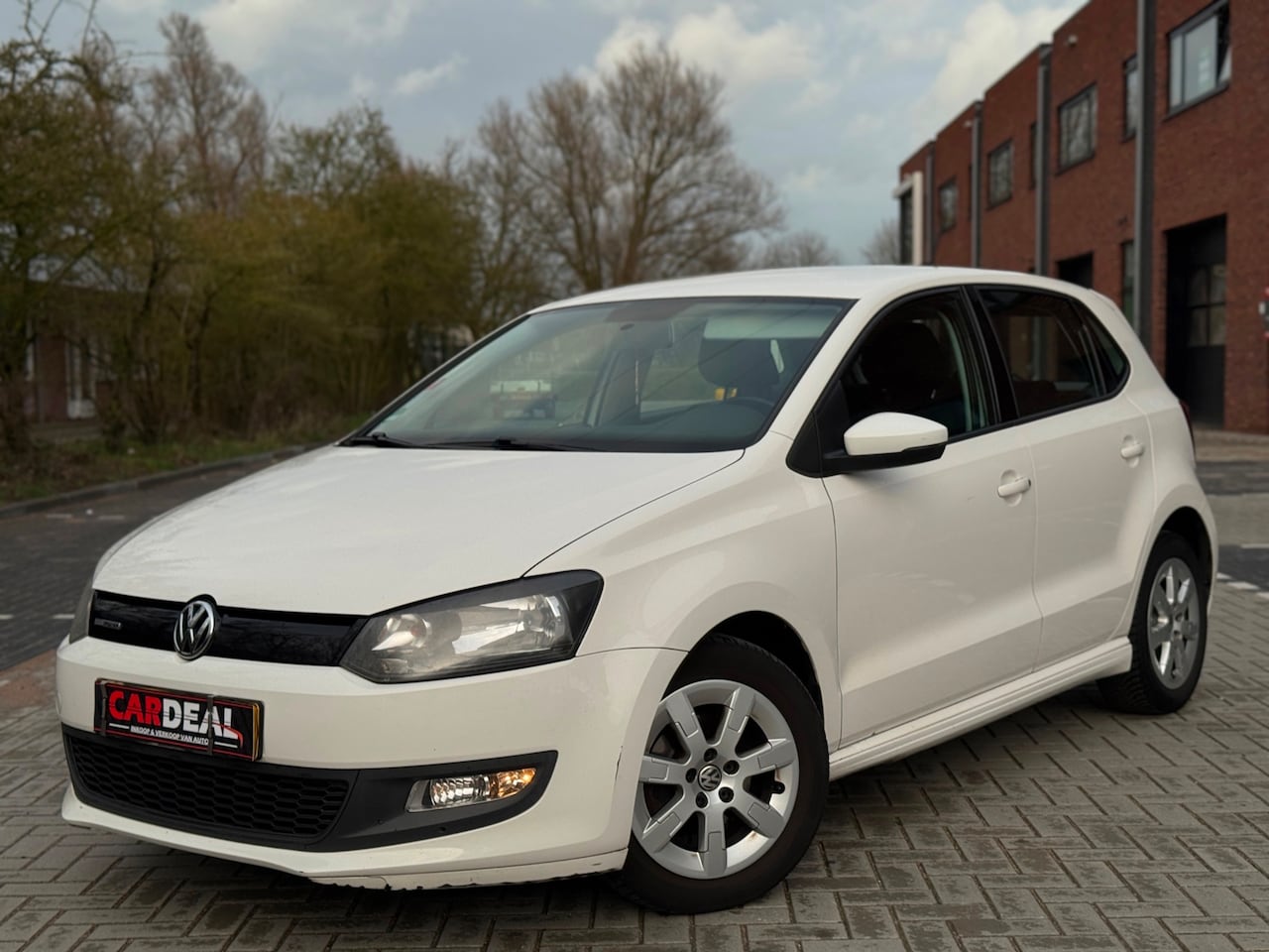 Volkswagen Polo - 1.2 TDI BMT comfort 2012 5DRS|AIRCO|CRUISE|NAVI|APK - AutoWereld.nl