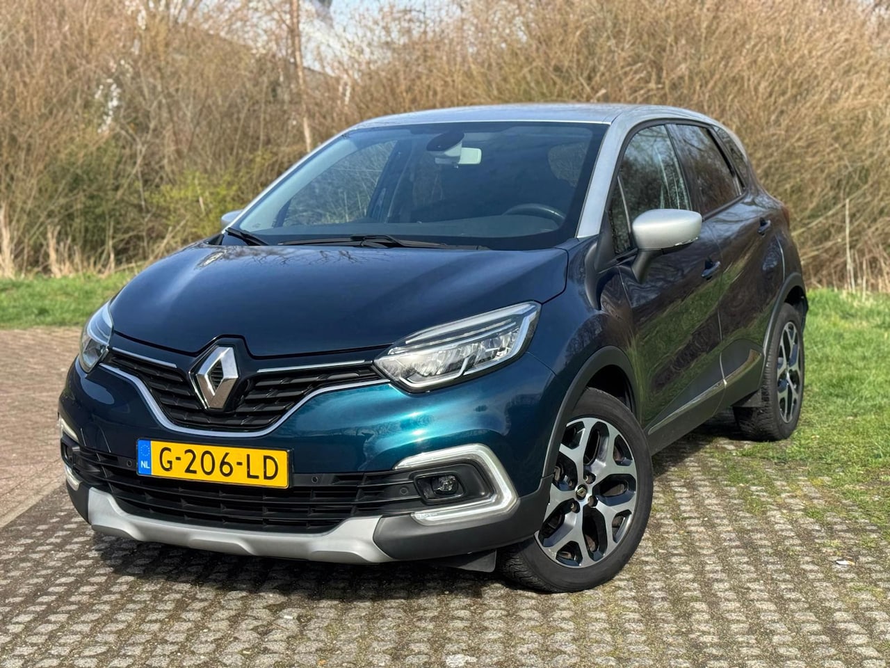Renault Captur - 0.9 TCe Limited / CAMERA / NAVI / LED - AutoWereld.nl