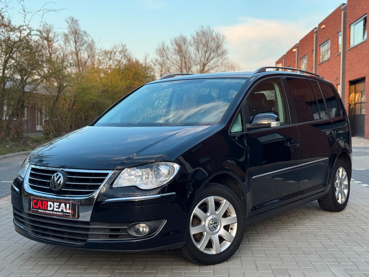 Volkswagen Touran - 1.4 TSI Optive AUTOMAAT|PANO|NAVI|LEDER|LMV - AutoWereld.nl