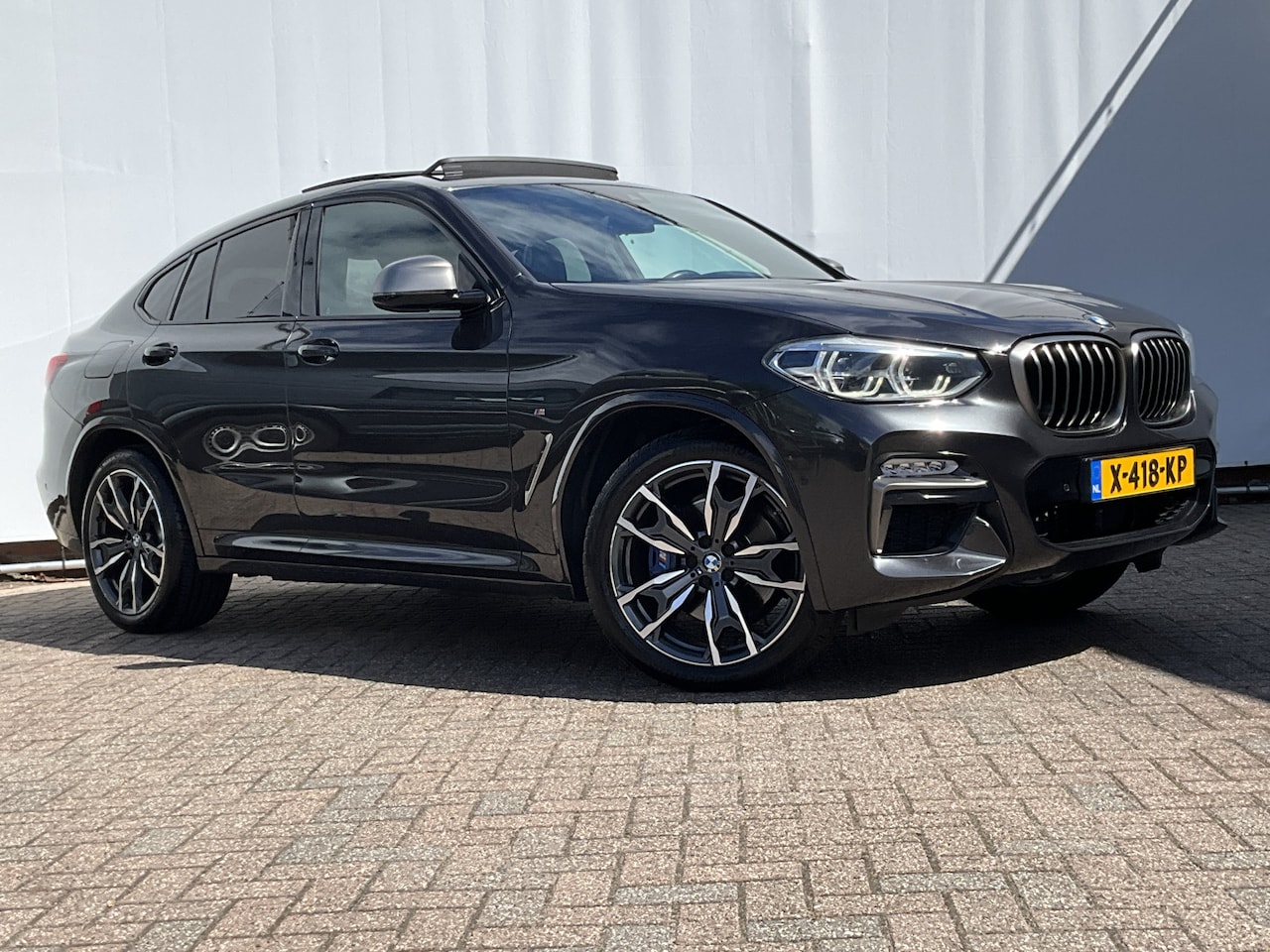 BMW X4 - M40i High Executive HUD Memory Pano.dak H/K M-Sport - AutoWereld.nl