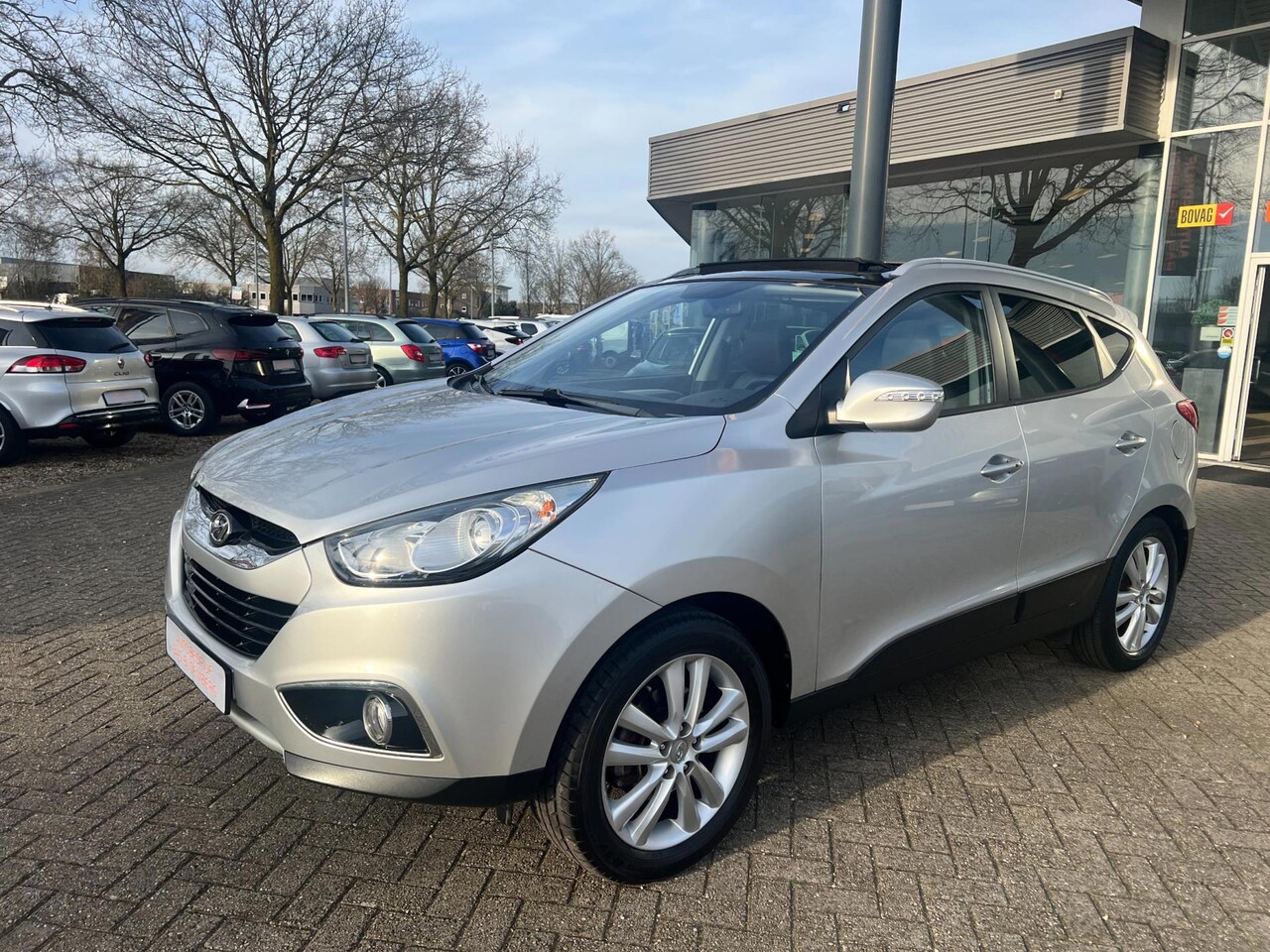 Hyundai ix35 - 2.0i i-Catcher 2.0i i-Catcher, Automaat, Navigatie, panodak, Clima, Bluetooth, etc - AutoWereld.nl