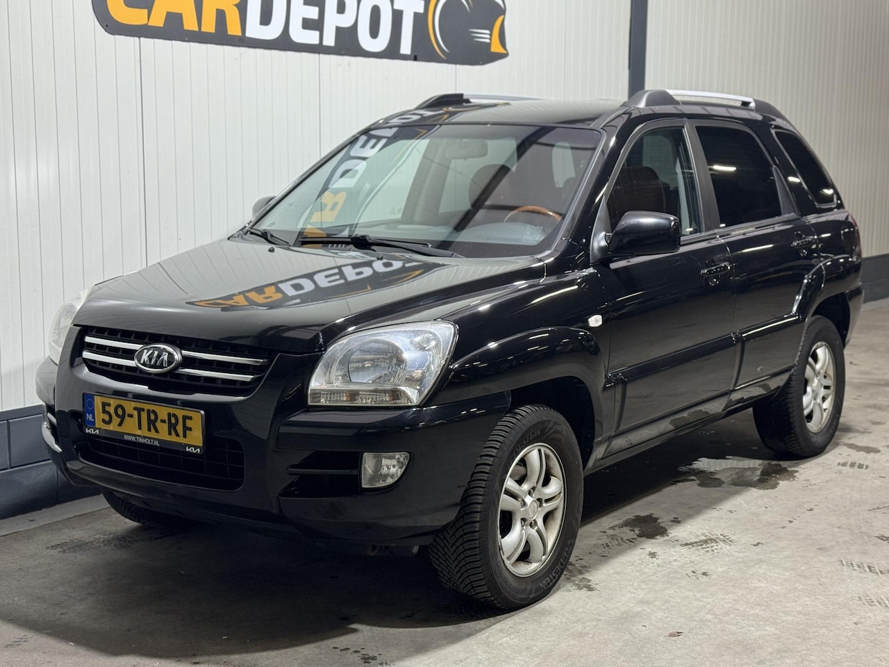Kia Sportage - 2.0 CVVT M-bition 2.0 CVVT M-bition - AutoWereld.nl