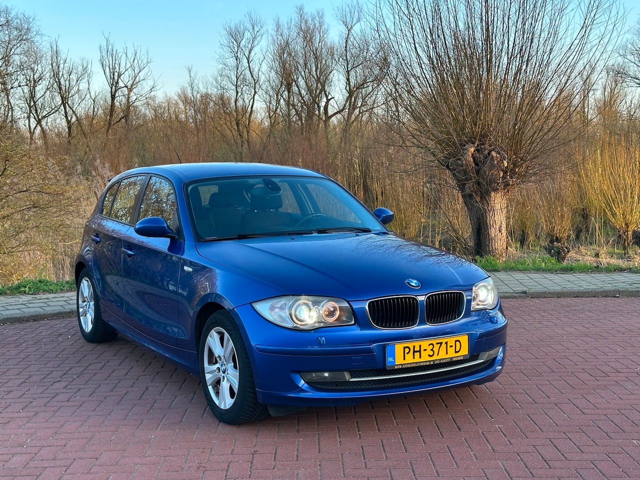 BMW 1-serie - 116i High Executive Airco - AutoWereld.nl