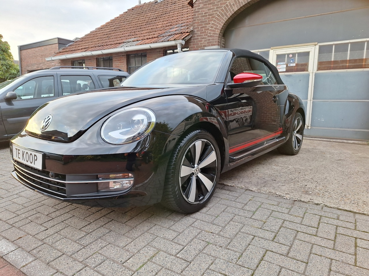 Volkswagen Beetle Cabriolet - 1.2 TSI Design CLUB edition - AutoWereld.nl