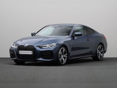 BMW 4-serie Coupé - M440i xDrive High Executive | M-sport | Achteruitrijcamera | Head Up | Laserlight | Elektr