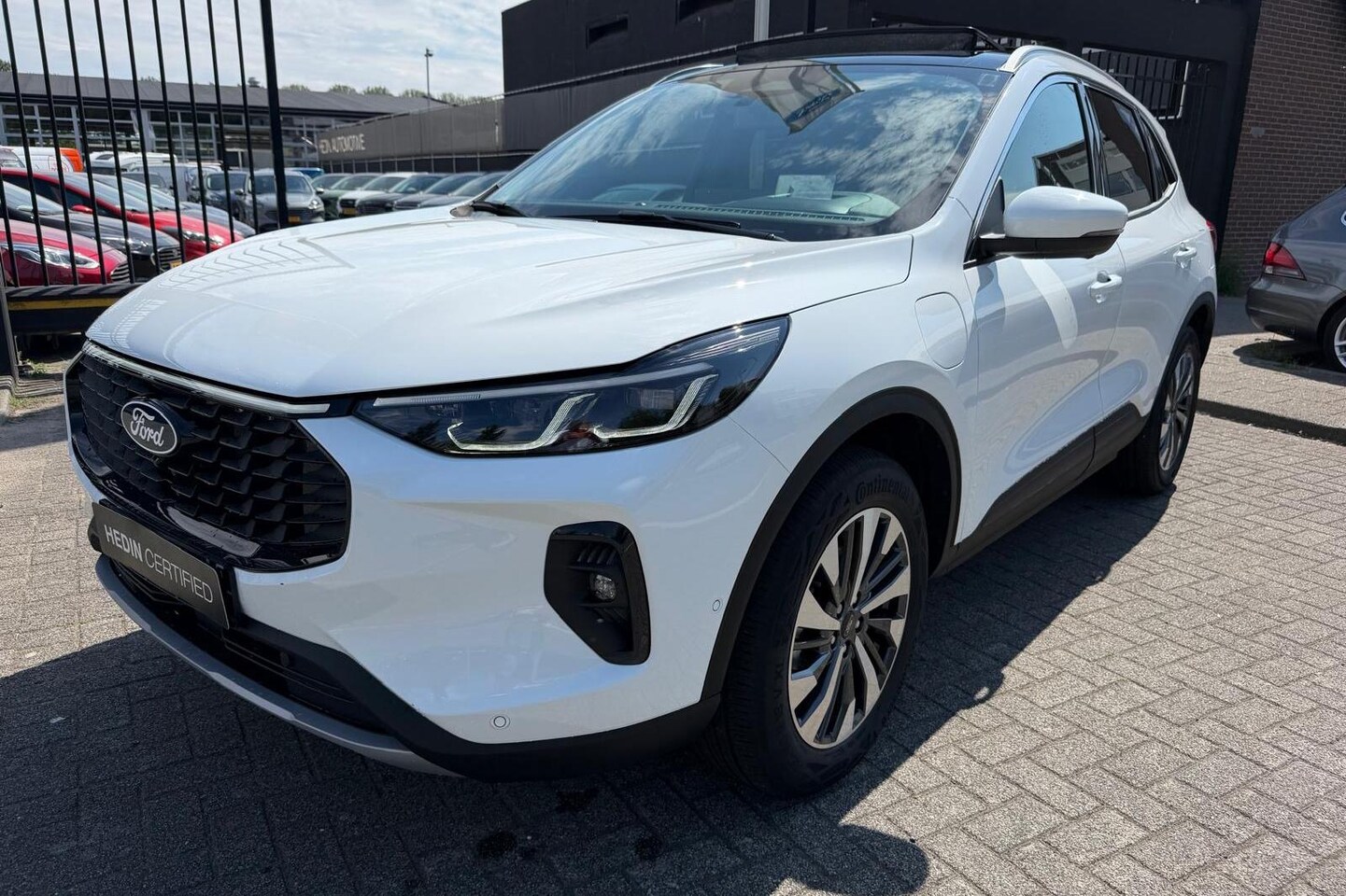 Ford Kuga - 2.5 PHEV Titanium | Driver assistent pack | Winter pack | Panorama dak | Adaptieve koplamp - AutoWereld.nl