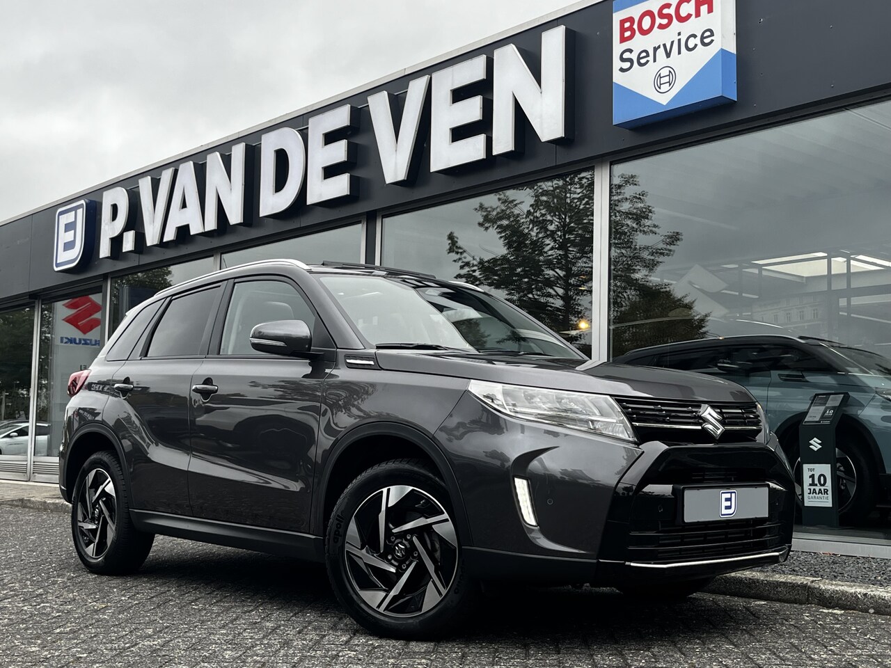 Suzuki Vitara - 1.4 Boosterjet Style Smart Hybrid 130pk/95kW 6-bak | Pano | Adapt. Cruise | Dodehoek | Cam - AutoWereld.nl