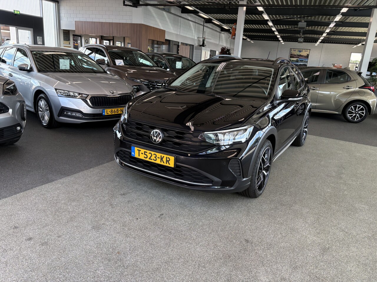 Volkswagen Taigo - 1.0 TSi Life Business LEDER/CAMERA/NAVI/VIRTUAL/ADAPT.CRUISE/18INCH - AutoWereld.nl