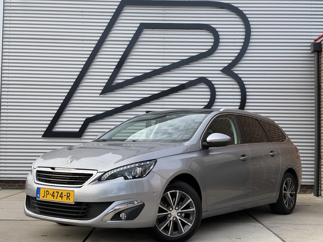Peugeot 308 SW - 1.2 PureTech Blue Lease Premium Navi|Pano|Camera|Clima|Cruise|Stoelverwarming|N.A.P|APK to - AutoWereld.nl