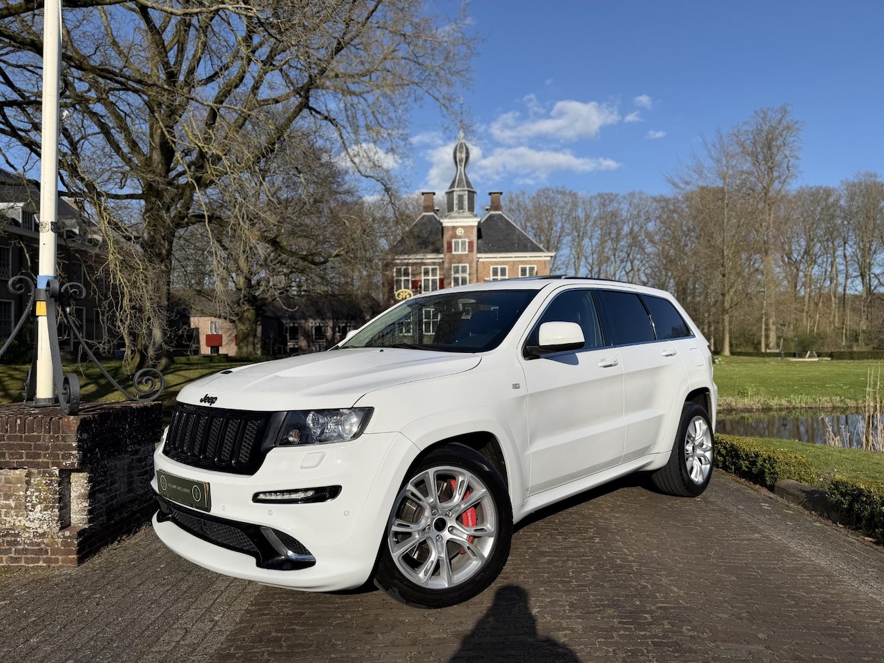 Jeep Grand Cherokee - 6.4 V8 SRT8 | Pano | Volledig Onderhouden | - AutoWereld.nl