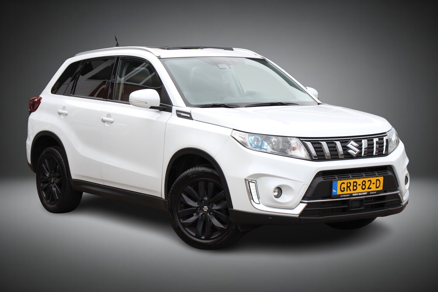 Suzuki Vitara - 1.4 Boosterjet Stijl/Style AllGrip Automaat | Opendak | Parkeersensoren rondom | - AutoWereld.nl