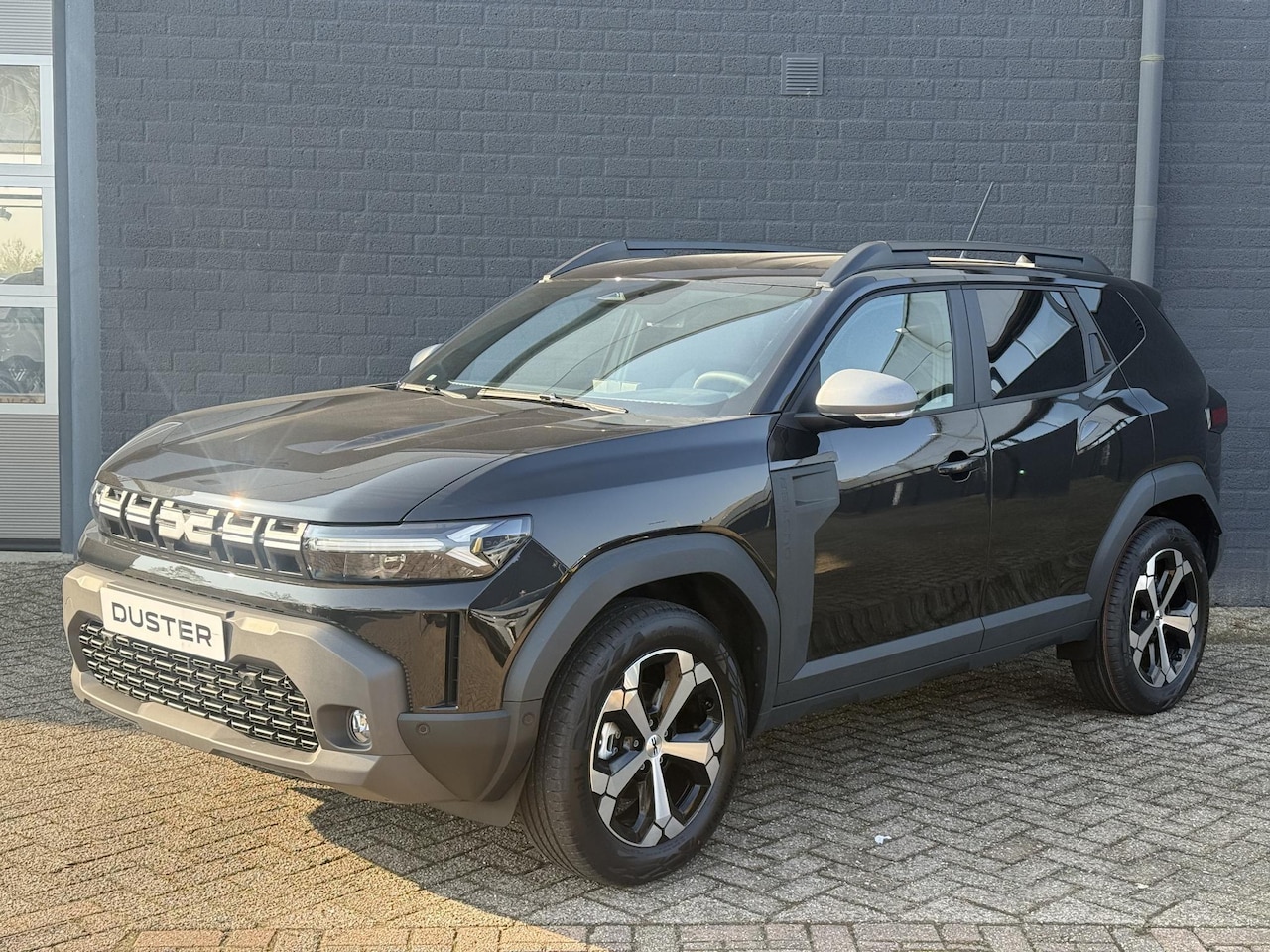 Dacia Duster - 1.8 hybrid 155 limited edition Camera | Navigatie | Stoel en stuur verwarming - AutoWereld.nl