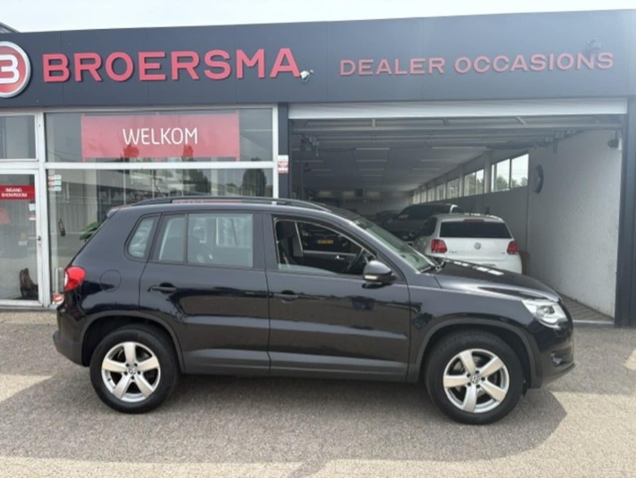 Volkswagen Tiguan - 1.4 TSI Sport&Style 1 EIGENAAR NL * DEALERONDERHOUDEN * - AutoWereld.nl