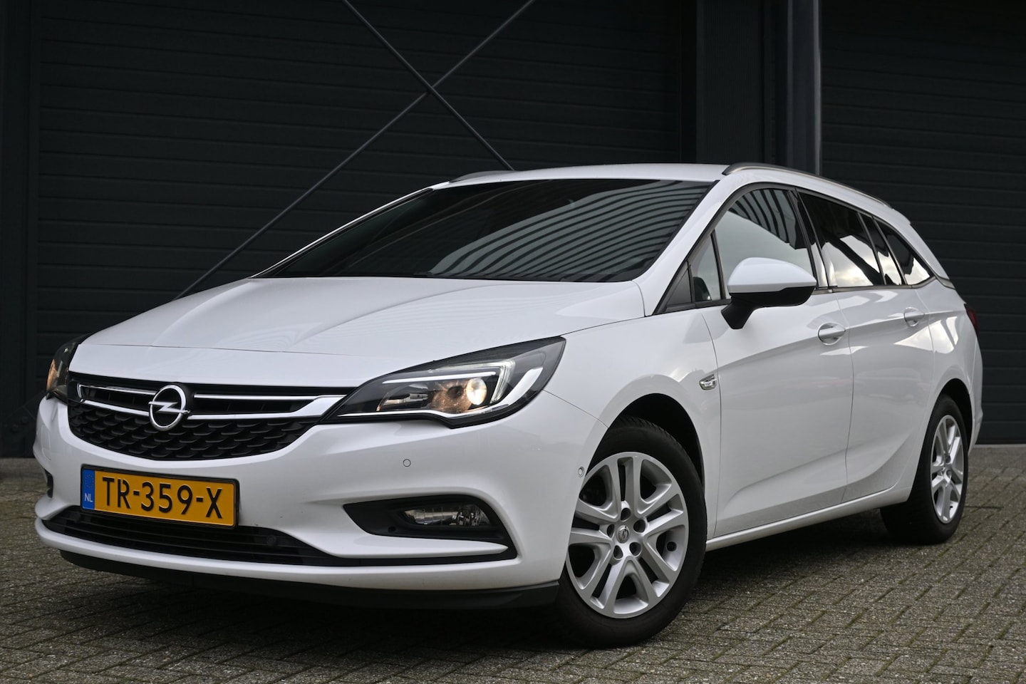 Opel Astra Sports Tourer - 1.0 Innovation 1.0 Innovation, Camera, PDC V+A, Trekhaak - AutoWereld.nl