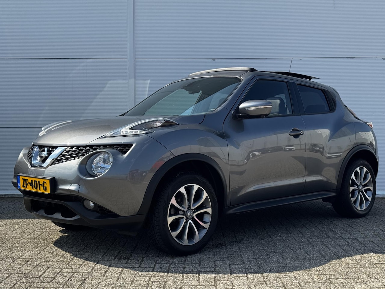 Nissan Juke - 1.6 Tekna / Elektrisch Schuif-/Kanteldak / Panoramadak / Navigatie / Achteruitrijcamera Ro - AutoWereld.nl