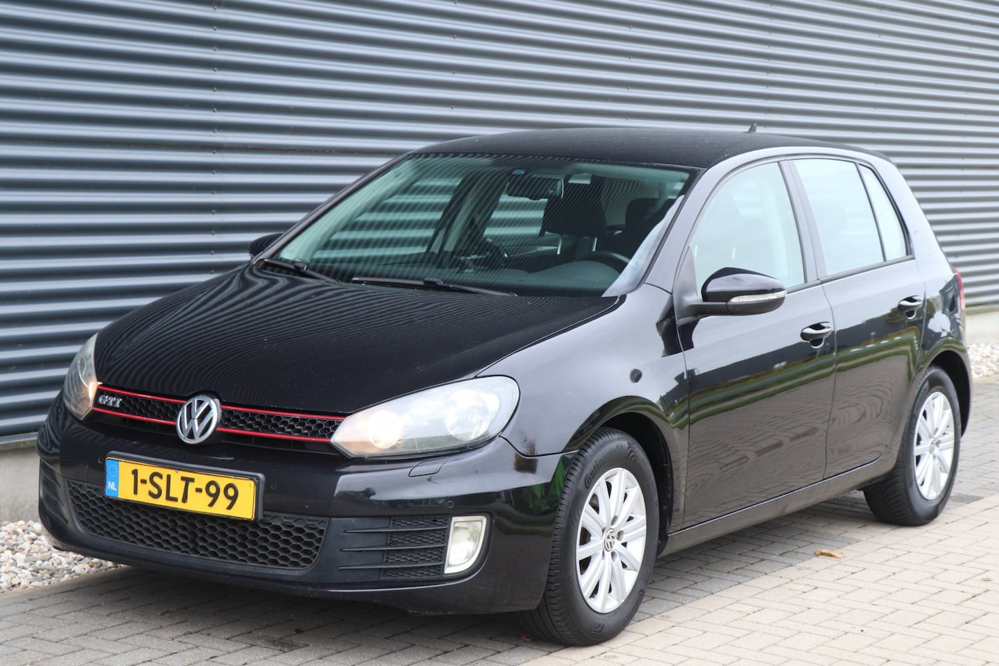 Volkswagen Golf - 1.2 TSI Comfortline BlueMotion | Airco | Navi | PDC - AutoWereld.nl