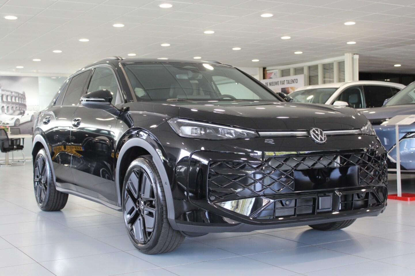 Volkswagen T-Roc - 1.5 eTSI R-Line/PANO/CAMERA/CARPLAY - AutoWereld.nl