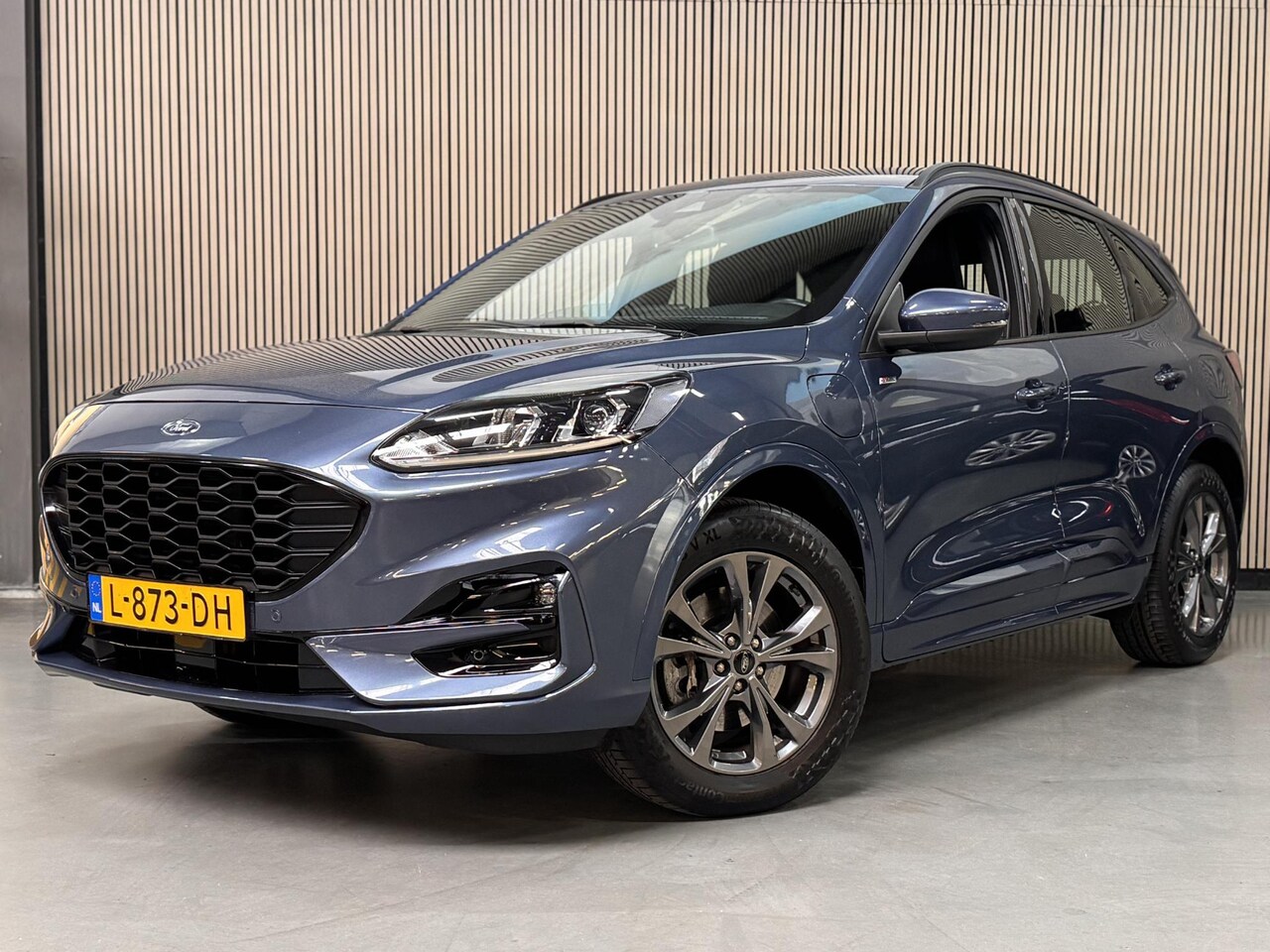 Ford Kuga - 2.5 PHEV 225pk ST-Line Navi Camera Wegklapbare Trekhaak NL-Auto Dealeronderhouden - AutoWereld.nl