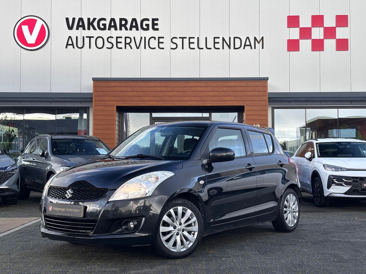 Suzuki Swift - 1.2 Comfort EASSS|Stoelverwarming|Airco|5-Deurs|Sportuitlaat - AutoWereld.nl