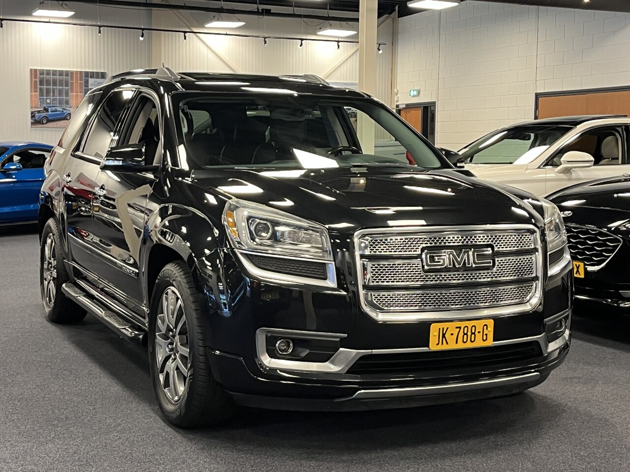 GMC Acadia - Denali 3.6i V6 AWD 288PK Automaat 7-Persoons Apple CarPlay SkyScape Roof - AutoWereld.nl