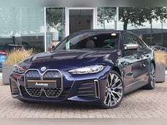 BMW i4 - (g26) M50 544pk M-Sport SoH 94% | Tansanietblau | Pano | 360 CAM | Laser | Harman/Kardon |