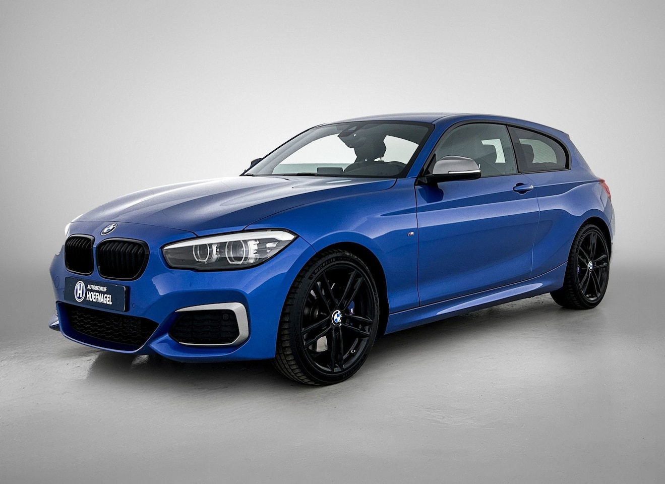 BMW 1-serie - M140i xDrive Edition Shadow | Harman/Kardon | Stoelverwarming | Memory Stoelen | Leder - AutoWereld.nl