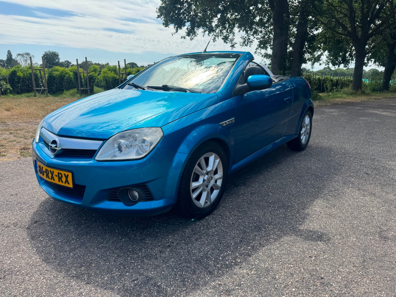 Opel Tigra TwinTop - 1.8-16V Linea Rosso | Nette auto - AutoWereld.nl