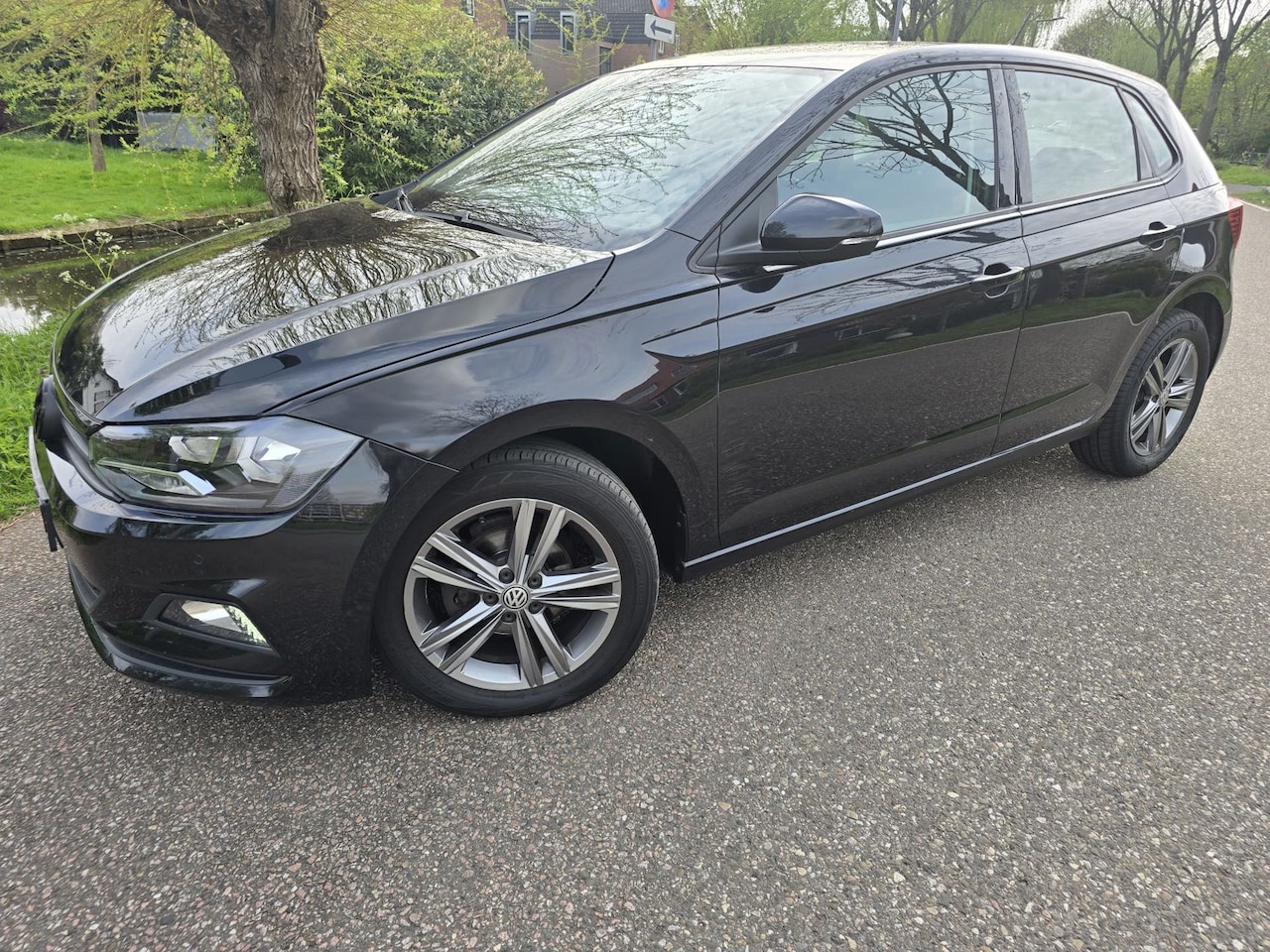 Volkswagen Polo - 1.0 TSI Comfortline/Airco/Navi/PDC v+a/APK 04-'27 - AutoWereld.nl