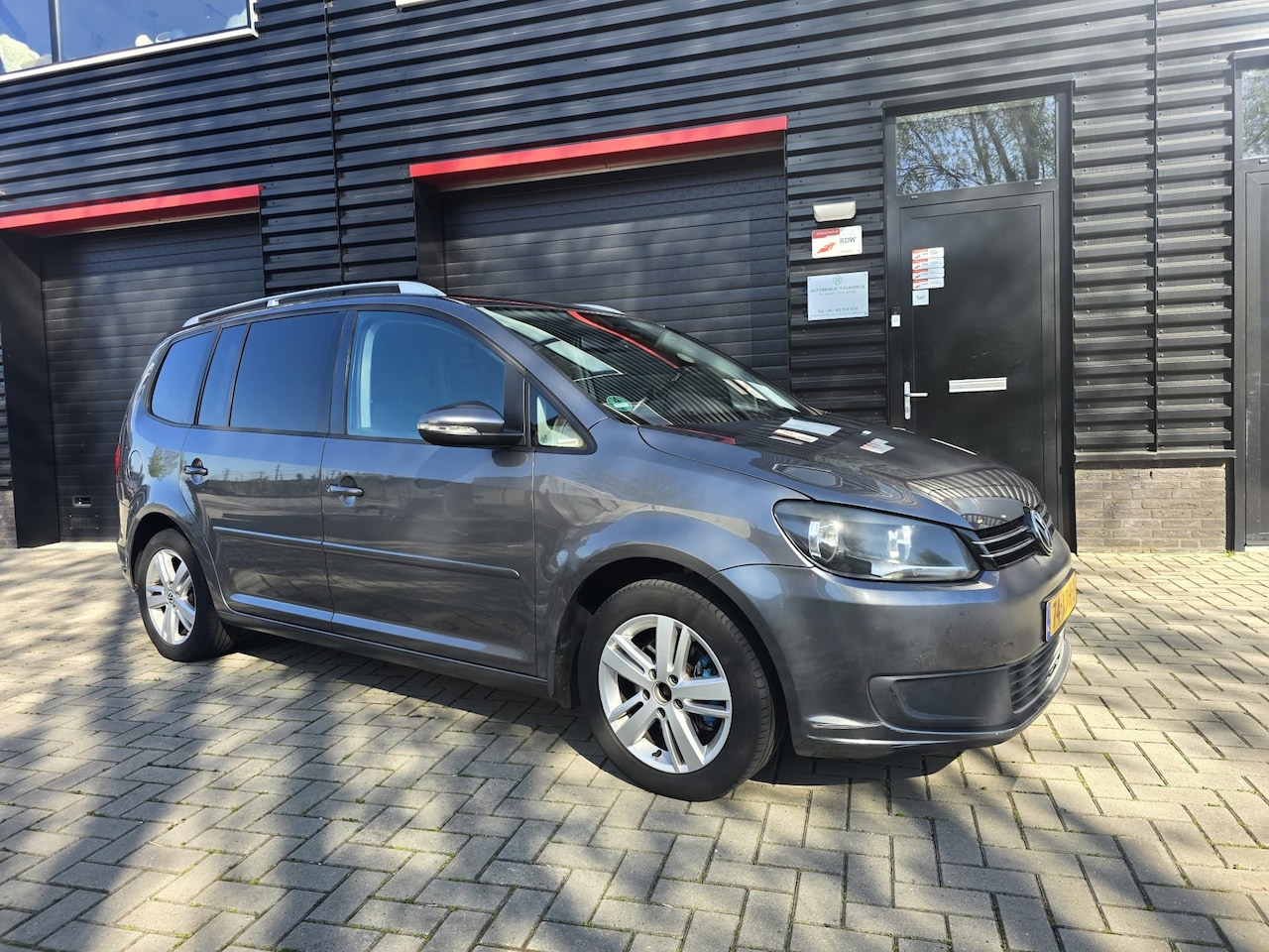 Volkswagen Touran - 1.6 TDI Comfortline BlueMotion 7p. | NAVI | BLUETOOTH | CRUISE CONTROL | ELEC. PAKKET - AutoWereld.nl