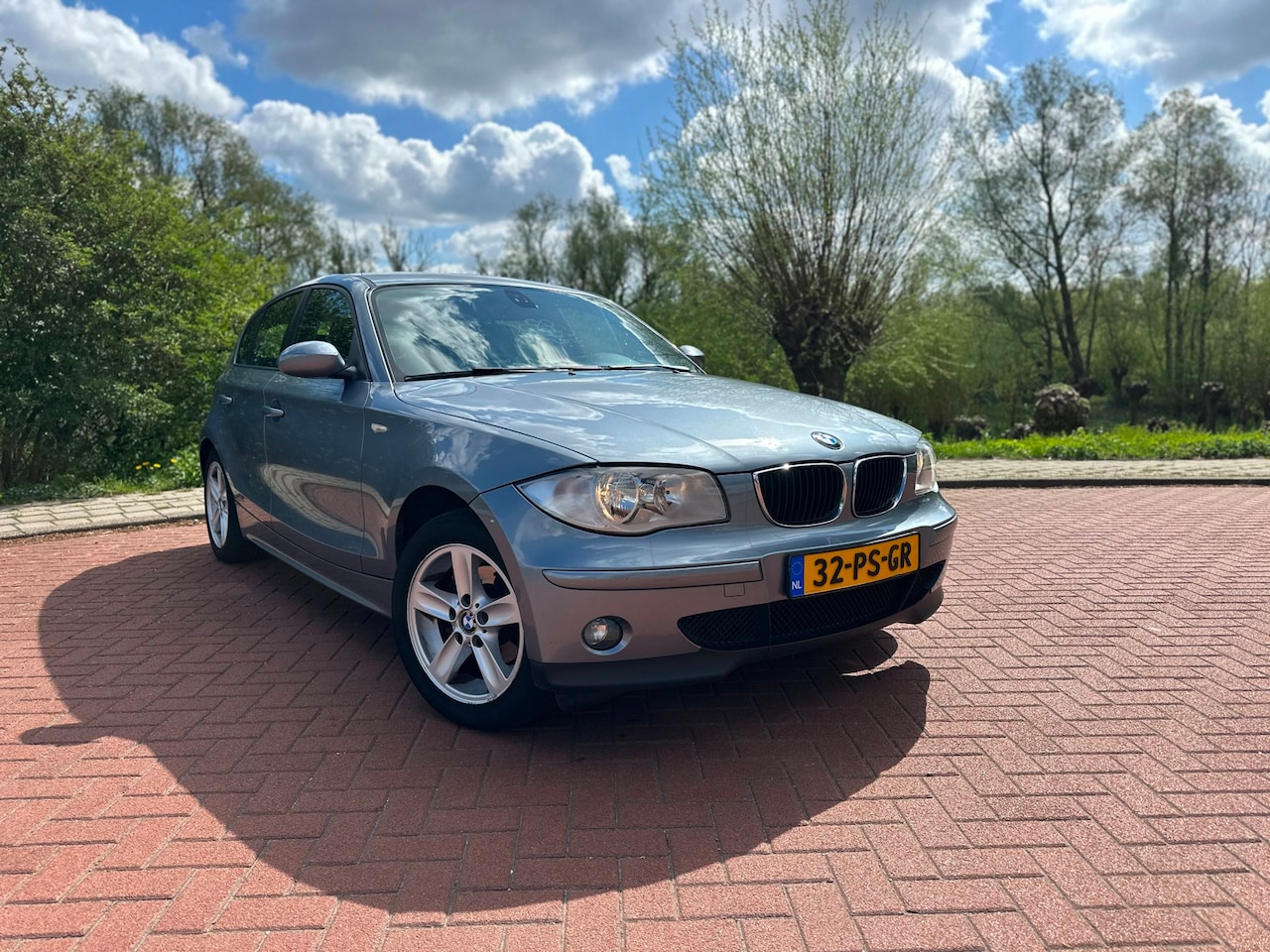 BMW 1-serie - 116i High Executive Airco/Nap - AutoWereld.nl