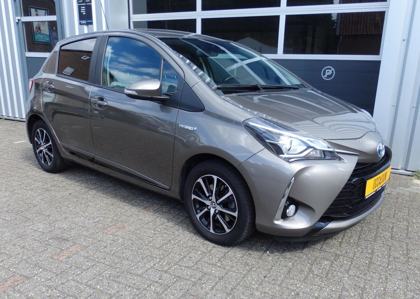 Toyota Yaris - 1.5 Hybrid Comfort | Navi | PDC | Fietsdrager trekhaak | - AutoWereld.nl