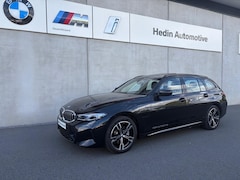 BMW 3-serie Touring - 330e M Sport pakket | Elektrisch verwarmde voorstoelen | Glazen panoramadak | Trekhaak met