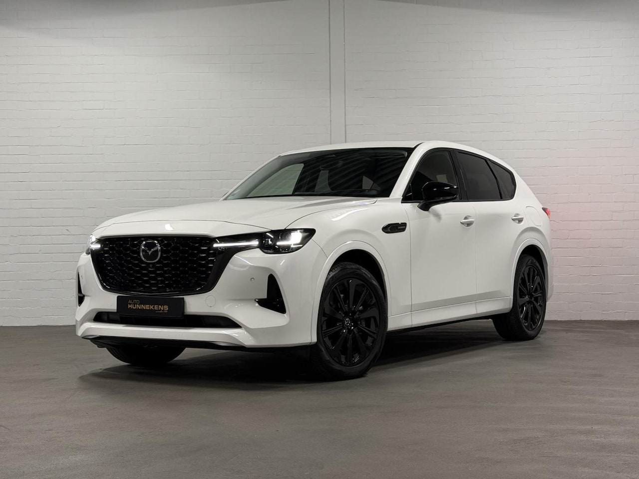 Mazda CX-60 - 2.5 e-SkyActiv PHEV Homura Trekhaak | Open dak | Adapt. cruise | Stoelventilatie | 360 cam - AutoWereld.nl