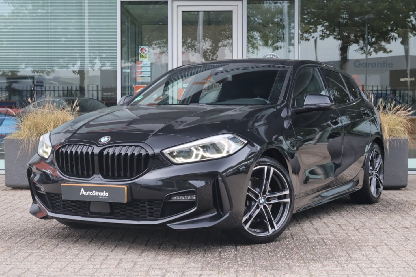 BMW 1-serie - (F40) 118i 140pk Aut M-Sport | Stoelverwarming | Climate | Carplay | Navi | Cruise | LED - AutoWereld.nl